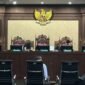 Agam Syarief Baharuddin, salah satu hakim yang menjatuhkan 'vonis lepas' kepada terdakwa korupsi fasilitas ekspor CPO, dalam sidang pembacaan surat dakwaan di Pengadilan Tipikor Jakarta, Kamis (2/1/8/2025). (Joke)