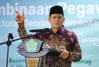 Wakil Menteri Agama H.R. Muhammad Syafi’i menyampaikan sambutan pada acara halal bihalal Itjen Kemenag di Jakarta, Rabu (8/4/2026). (Humas Kemenag)