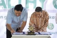 Penandatanganan kerja sama Lazismu UMY dengan RS AMC Muhammadiyah yang ditandatangani oleh Kepala Kantor Lazismu UMY dan Direktur Administrasi, Umum, dan Keuangan RS AMC Muhammadiyah