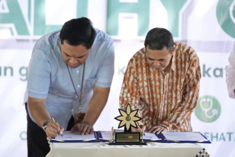 Penandatanganan kerja sama Lazismu UMY dengan RS AMC Muhammadiyah yang ditandatangani oleh Kepala Kantor Lazismu UMY dan Direktur Administrasi, Umum, dan Keuangan RS AMC Muhammadiyah