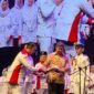 Prosesi pelantikan pengurus DPP, DPD, dan DPC Srikandi Jaga Desa dan Kelurahan oleh Ketua Dewan Pembina Srikandi Jaga Desa Hashim Djojohadikusumo yang didampingi Sekretaris Jenderal DPP ABPEDNAS Adhitya Yusma Perdana di Ballroom The Djakarta Theater, Jakarta, Jumat (3/7/2026).