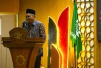 Direktur Al Islam dan Kemuhammadiyahan UMY, Taufiqur Rahman, S.IP., M.A., Ph.D., memberikan apresiasi dalam sambutannya kepada residen Unires UMY yang lulus program pembinaan

