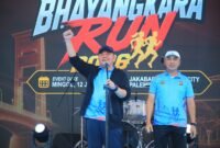 Gubernur Sumatera Selatan didampingi Kapolda Sumsel Irjen Pol. memberikan sambutan Sumsel Bhayangkara Run 2026 di Stadion Gelora Sriwijaya
