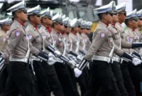 Ilustrasi - Pasukan polisi (CNBC)