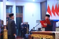 Herman Deru memimpin prosesi pengukuhan Farid Firman sebagai Kepala Perwakilan BPKP Provinsi Sumsel yang baru.